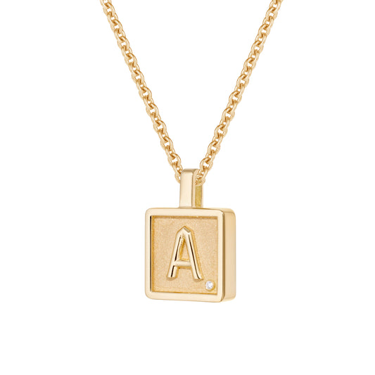Letter-necklace-字-stoned-yellow-gold-with-diamond